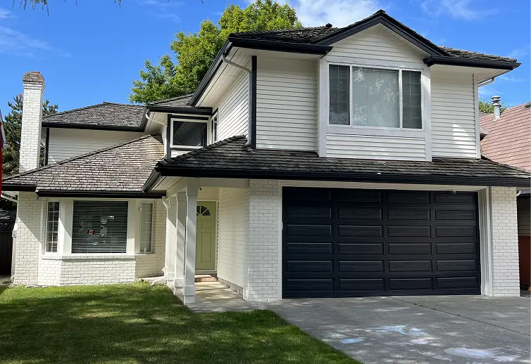 Beautifully updated warm tan house siding with a clean finish by a professional Calgary painting contractor