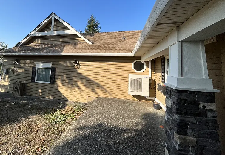 Weathered exterior trim and dull siding on a Calgary property before surface preparation and painting