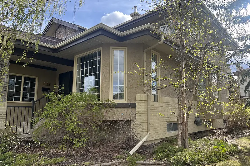Residential exterior painting completed in Christie Estates, Calgary, enhancing the home's beauty and value
