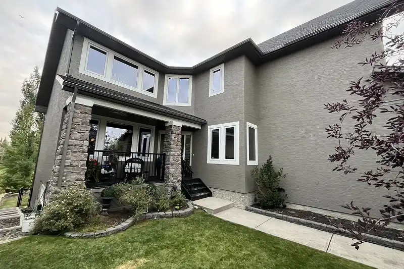 Full house exterior transformation in Discovery Ridge, Calgary, with premium painting and detailed finishing work