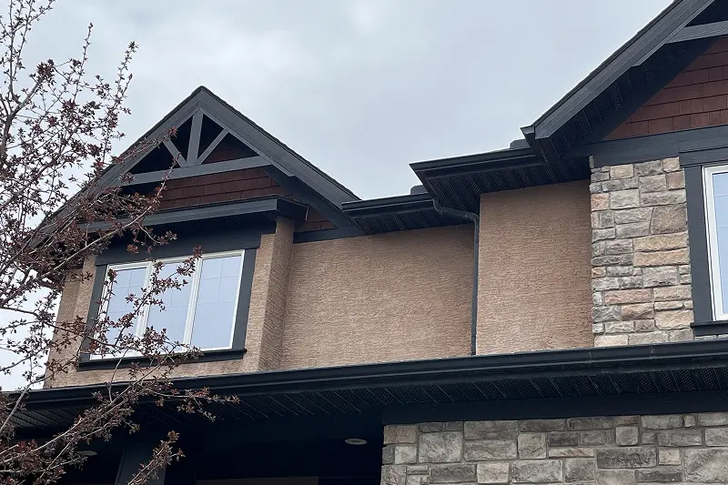 Detailed exterior door and trim painting service in Aspen Woods, Calgary, featuring crisp lines and durable weather-resistant paint