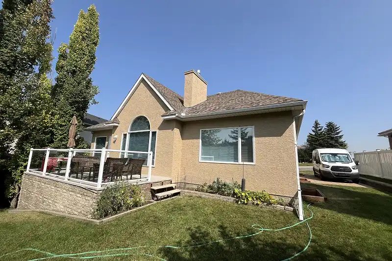 Complete exterior house painting project in Patterson, Calgary, showcasing expert craftsmanship and attention to detail