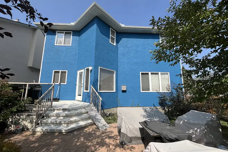 Exterior home transformation through professional painting services in Strathcona Park, Calgary, improving beauty, value, and weather resistance