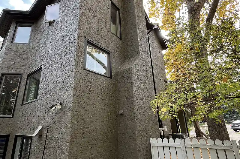 Complete exterior house painting project in Coach Hill, Calgary, showcasing expert craftsmanship and attention to detail