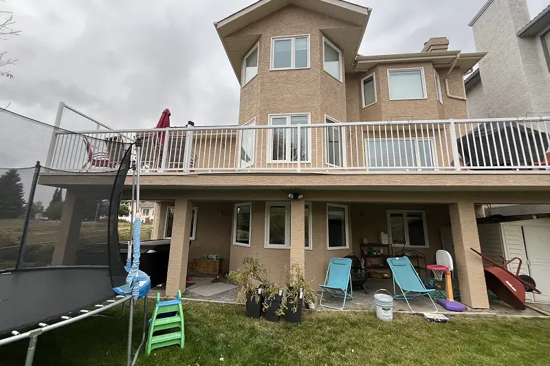 Professional full exterior house painting in Scenic Acres, Calgary, enhancing curb appeal with a fresh and durable finish