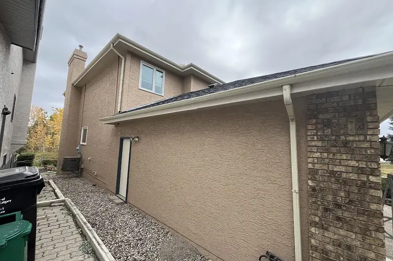 Freshly painted residential home exterior in Scenic Acres, Calgary, featuring expert craftsmanship and weather-resistant protection