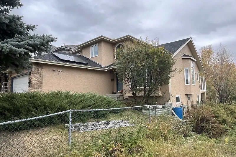 Complete exterior house painting project in Scenic Acres, Calgary, showcasing a modern appearance and detailed finishing work