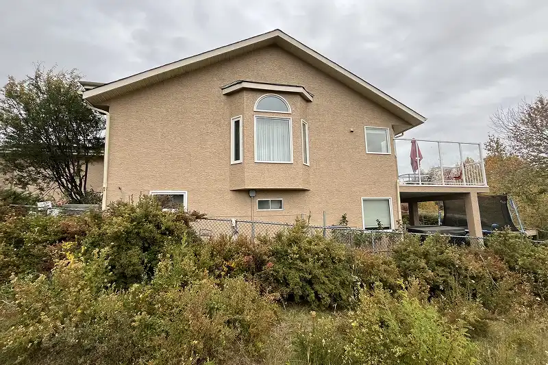 Exterior home transformation through professional painting services in Scenic Acres, Calgary, improving beauty and long-term durability