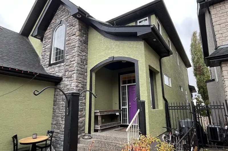Complete exterior house painting project in Arbour Lake, Calgary, showcasing quality craftsmanship and attention to detail
