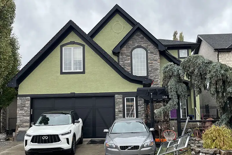 Professional full exterior house painting in Arbour Lake, Calgary, featuring a refreshed appearance and enhanced curb appeal