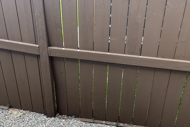 Professional fence and deck staining in Evanston, Calgary, enhancing the appearance and longevity of outdoor wood surfaces