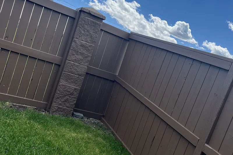 Completed fence and deck staining project in Evanston, Calgary, showcasing durable craftsmanship and a refreshed outdoor living space