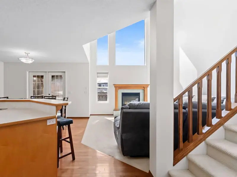 Modern Calgary home interior painting project showcasing bright walls, open-concept layout, and abundant natural light.